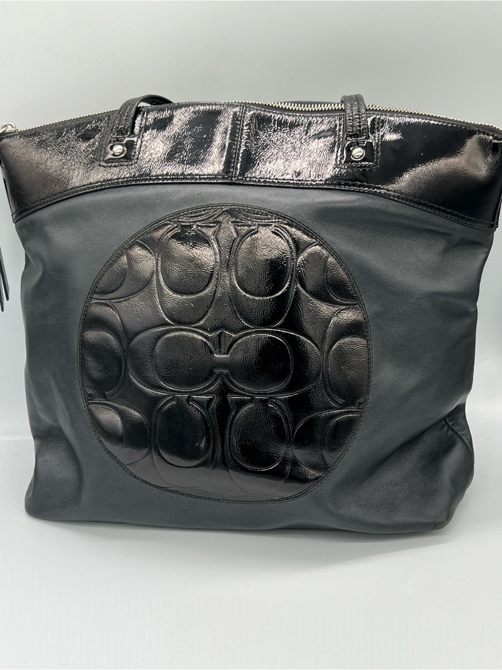 Coach Black Leather Tote Bag with Signature Embossed Circle